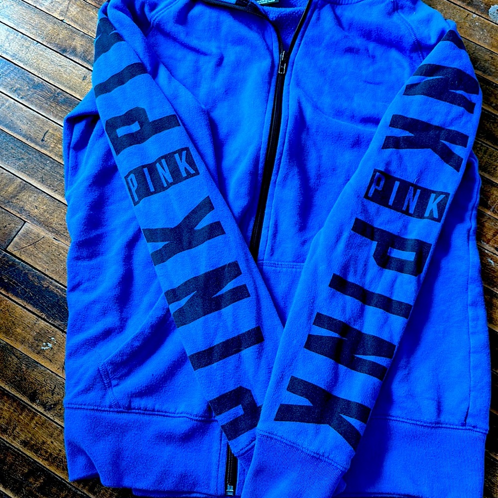 Pink hoodie there is a little bleach stain on the elbow